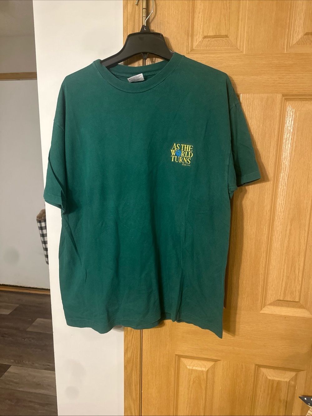 Vintage As the World Turns tshirtGreen Short Sleeve Graphic Tee with Yellow Logo